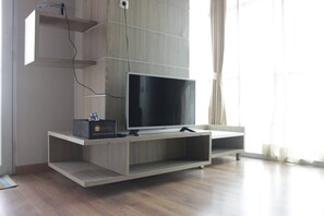 Room | Living room | TV - Simply 1BR Apartment at Stanford Jatinangor (Cileunyi)