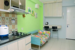 Room | Private kitchen - Comfortable 2BR Bassura City Apartment near Bassura Mall (Jakarta)