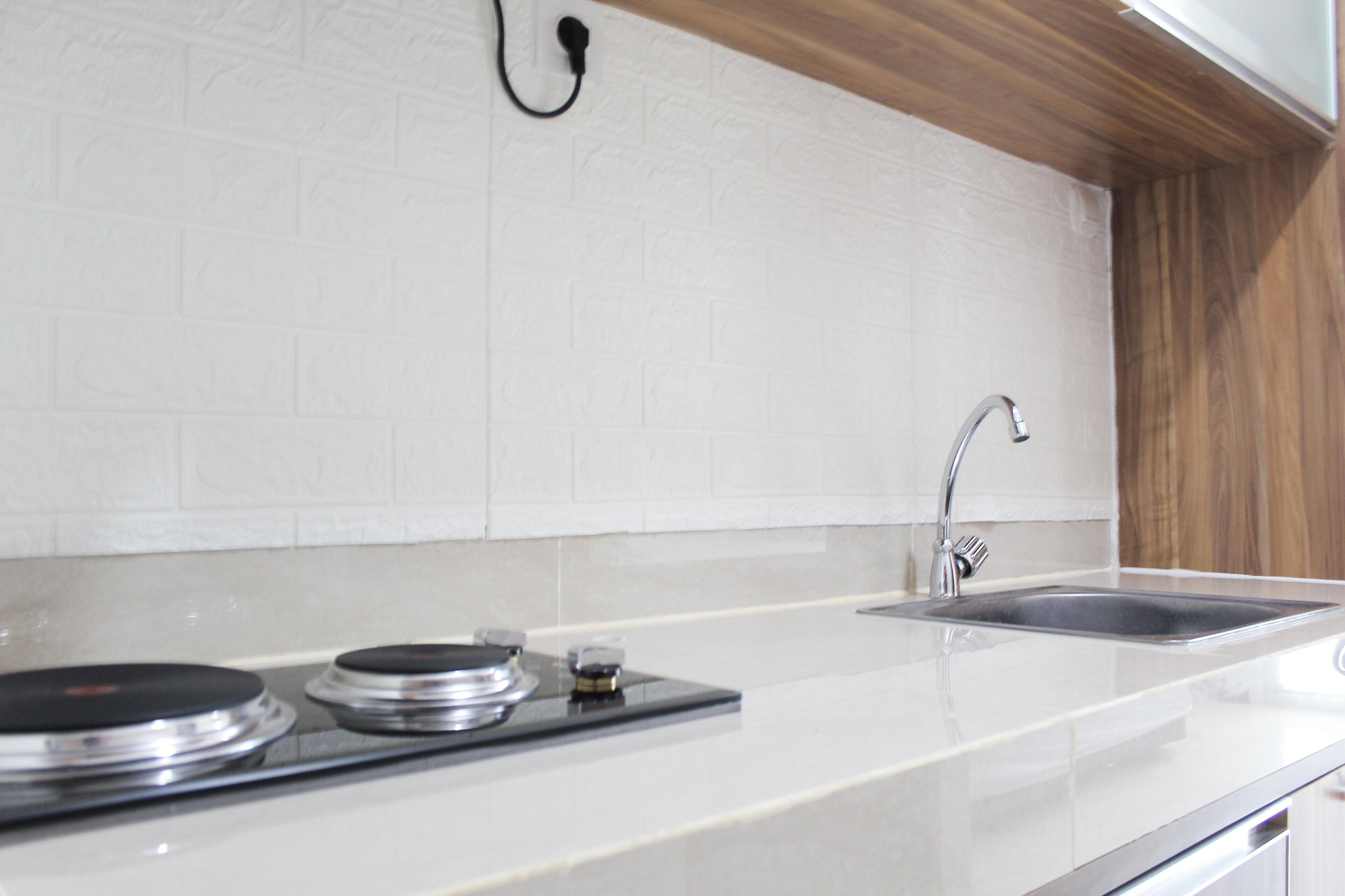 Habitación | Cocina privada | Refrigerador, parrilla de estufa, lavavajillas y utensilios de cocina 