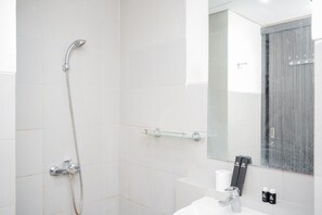 Room | Bathroom | Shower, free toiletries, towels - Modern Classic Studio Room Bintaro Icon Apartment (South Tangerang)