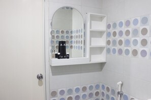 Room | Bathroom | Shower, free toiletries, towels - Comfortable 2BR Apartment at Grand Asia Afrika Residence near Alun Alun Bandung (Bandung)