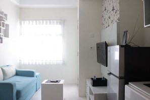 Room | Living area | TV - Comfortable 2BR Apartment at Grand Asia Afrika Residence near Alun Alun Bandung (Bandung)