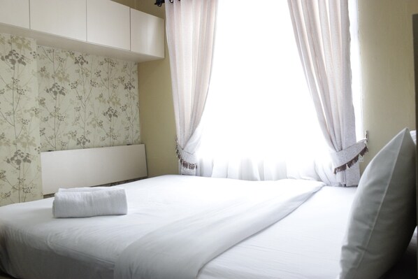 Room | 2 bedrooms, free WiFi, bed sheets - Comfortable 2BR Apartment at Grand Asia Afrika Residence near Alun Alun Bandung (Bandung)