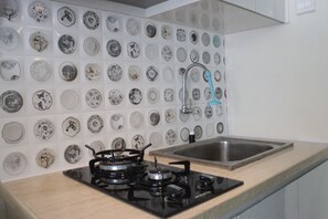 Habitació | Cuina privada | Frigorífic, microones, placa de cuina i rentaplats
