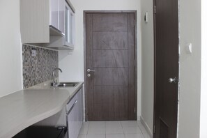Room | Free WiFi, bed sheets - Comfy Studio Apartment at Harvard Jatinangor near UNPAD (Cileunyi)
