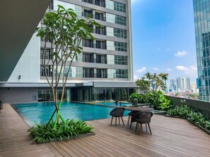 Outdoor pool - Modern 1BR at Ciputra World 2 Apartment (Jakarta)