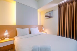 1 bedroom, free WiFi, bed sheets - Comfort 1BR Apartment at Mustika Golf Residences (Cikarang)