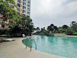 Outdoor pool - Comfort 2BR Apartment at Cervino Village (Jakarta)