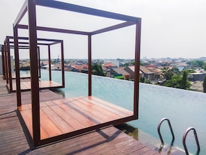 Outdoor pool - Modern and Spacious Studio with City View @ Grand Kamala Lagoon Apartment (Bekasi)