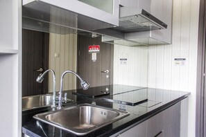 Private kitchen - Minimalist and Cozy Studio Bintaro Icon Apartment (South Tangerang)
