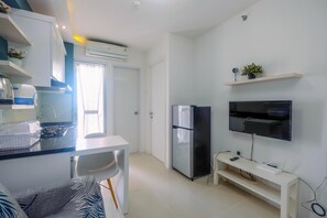 TV - Clean and Simply Cozy 2BR Bassura City Apartment (Jakarta)