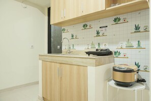 Private kitchen - Comfy and Modern 2BR at Meikarta Apartment (Cikarang)