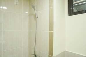 Room | Bathroom | Shower, free toiletries, towels - Comfy and Modern 2BR at Meikarta Apartment (Cikarang)