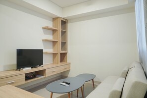 Room | Living area | TV - Comfy and Modern 2BR at Meikarta Apartment (Cikarang)