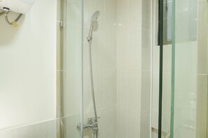 Room | Bathroom | Shower, free toiletries, towels - Brand New and Modern 2BR Meikarta Apartment (Cikarang)