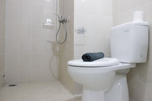 Room | Bathroom | Shower, free toiletries, towels - Simply 2BR without Living Room Apartment at Parahyangan Residence (Bandung)
