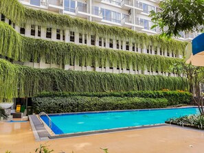 Outdoor pool - Comfortable 2BR Apartment at Bintaro Plaza Residence (South Tangerang)