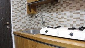 Room | Private kitchen - Marvelous & Scenic 2BR at Jarrdin Cihampelas Apartment (Bandung)