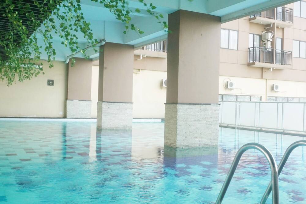 Comfy & Well Appointed 2BR at Tamansari Panoramic Apartment