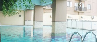 Comfy & Well Appointed 2BR at Tamansari Panoramic Apartment