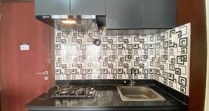 Comfy & Well Appointed 2BR at Tamansari Panoramic Apartment