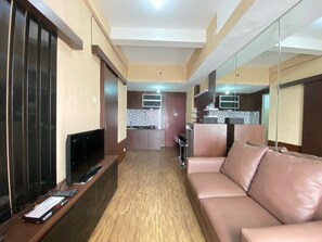 Room | Bathroom | Shower, free toiletries, towels - Spacious 1BR at Tamansari Panoramic Apartment near Metro Indah Mall (Bandung)