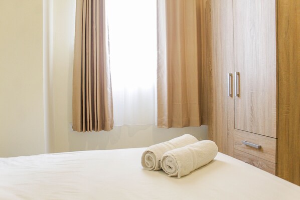 Room | 2 bedrooms, free WiFi, bed sheets - Comfy 2BR at Meikarta Apartment (Cikarang)