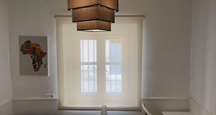 Typical town house on the ground floor, well lit and a large equipped terrace.