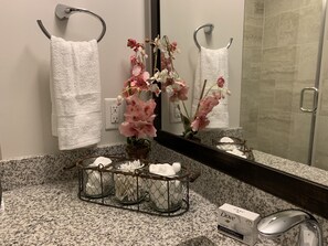 Shower, towels, soap, shampoo