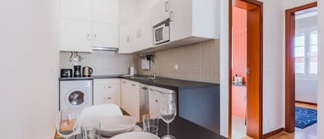 Apartment, 2 Bedrooms | Private kitchen | Fridge, microwave, stovetop, dishwasher