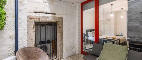 Monolocale, patio | Terrazza/patio