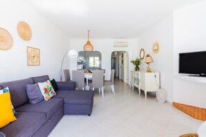 Apartment, 2 Bedrooms | Living area | 50-cm flat-screen TV with cable channels, TV - Happy House in Clube Albufeira (Albufeira)