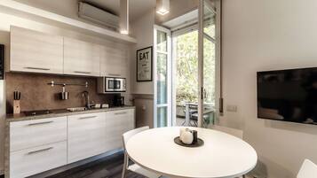 City-Apartment | Hochwertige Bettwaren, Daunenbettdecken, Bügeleisen/Bügelbrett