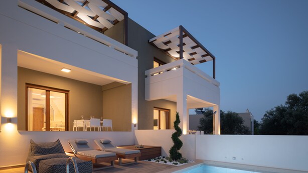 A modern two-story house with a swimming pool, outdoor seating, and a pergola. - De.Light Boutique Villa II, close to Rethymno (Atsipopoulo)