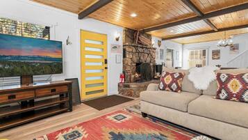 TV, fireplace, books, offices