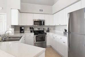 Family Apartment, 2 Bedrooms (Self Check-in with Virtual Front Desk) | Private kitchen | Full-size fridge, microwave, oven, stovetop - Kasa Wellington South Florida (Wellington)