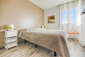 2 slaapkamers, een strijkplank/strijkijzer, gratis wifi