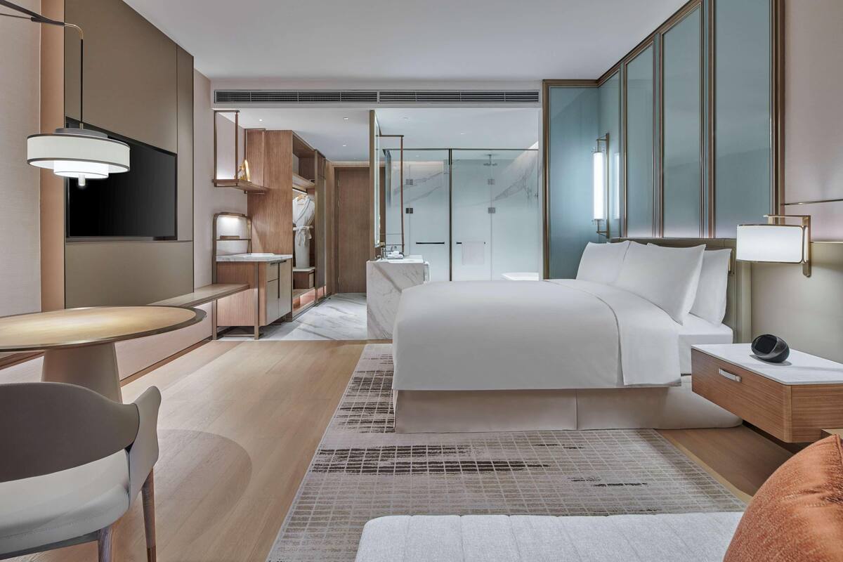 Premium bedding, down comforters, minibar, in-room safe