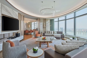 Presidential Suite, 1 King Bed | Living area | 55-inch LCD TV with satellite channels, TV, smart speakers - Hilton Changsha Riverside (Changsha)
