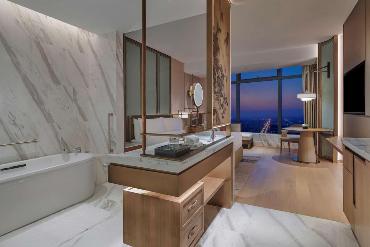 Separate bathtub and shower, rainfall showerhead, free toiletries