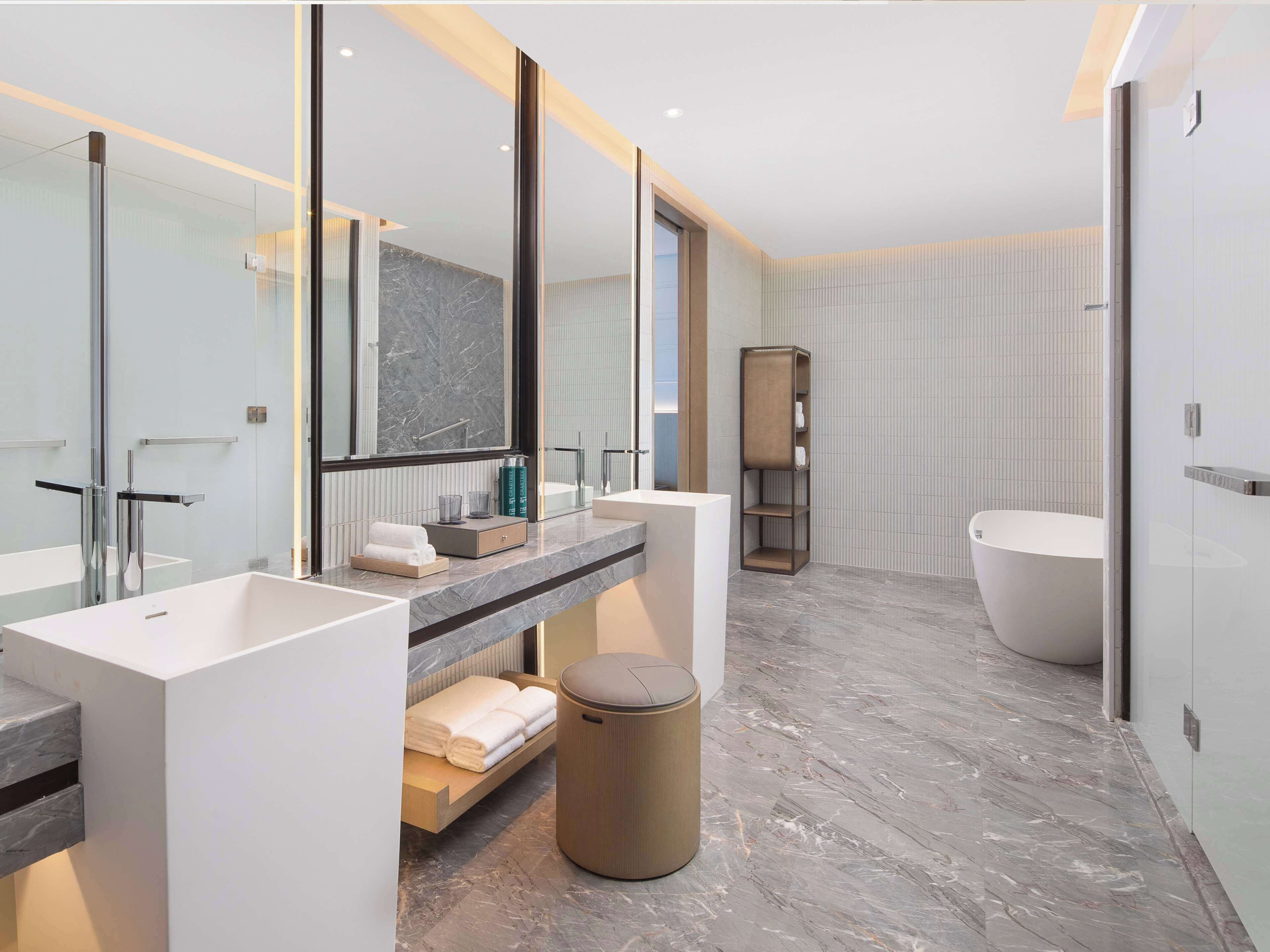 king premier suite | bathroom | shower, rainfall showerhead, designer toiletries, hair dryer