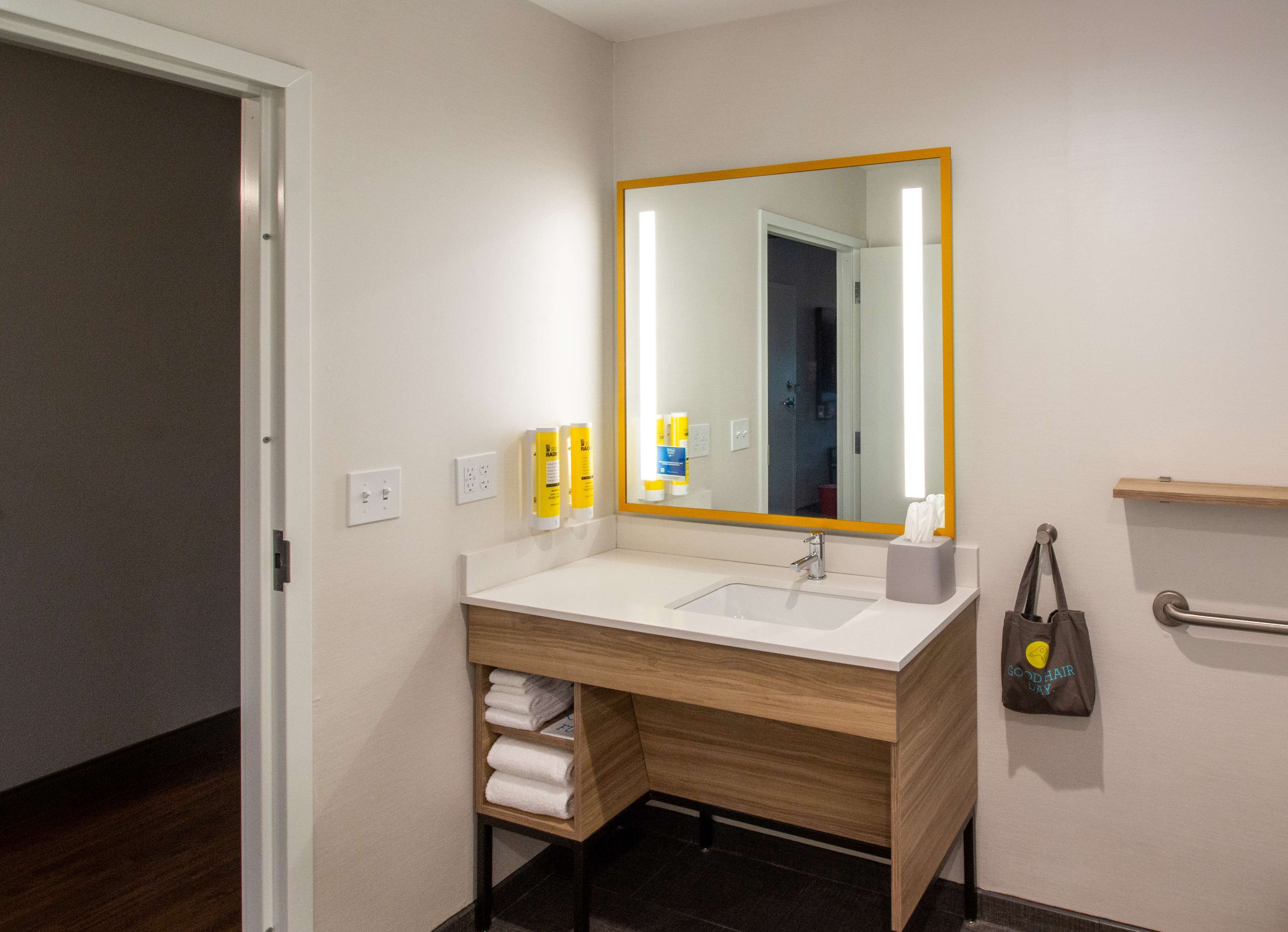 hair dryer, towels, soap, shampoo