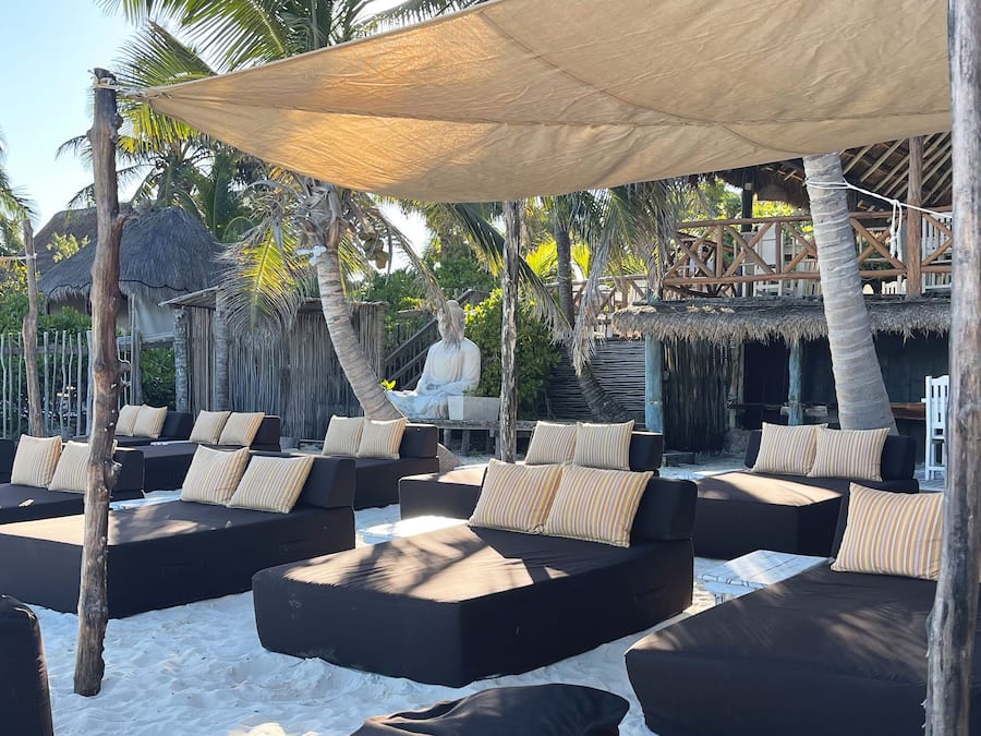 On the beach, white sand, sun loungers