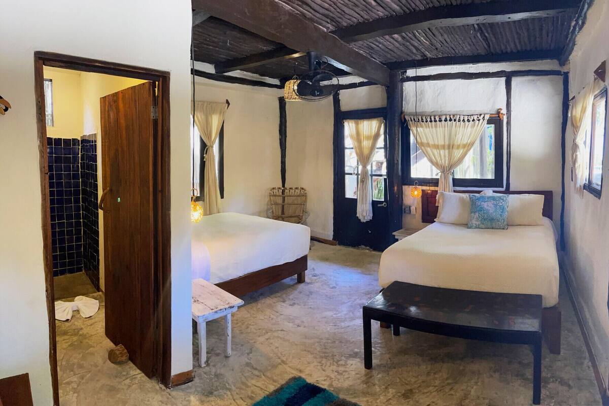 Premium bedding, down duvets, pillow-top beds, in-room safe