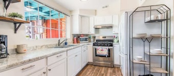 This centrally located 3 bedroom 2 bathroom features a full size pool and electric vehicle charging on site.