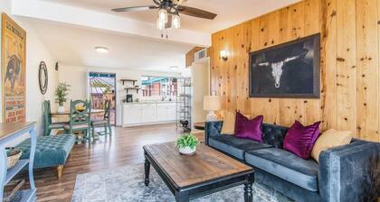 This centrally located 3 bedroom 2 bathroom features a full size pool and electric vehicle charging on site.