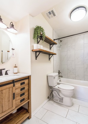 Combined shower/tub, hair dryer