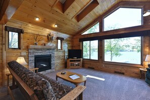 Room, Multiple Beds, Patio, Beach View | Living area | 32-inch TV with cable channels