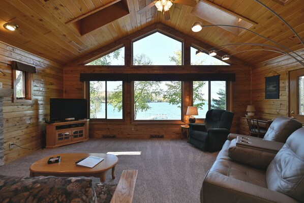 Room, Multiple Beds, Patio, Beach View | Living area | 32-inch TV with cable channels