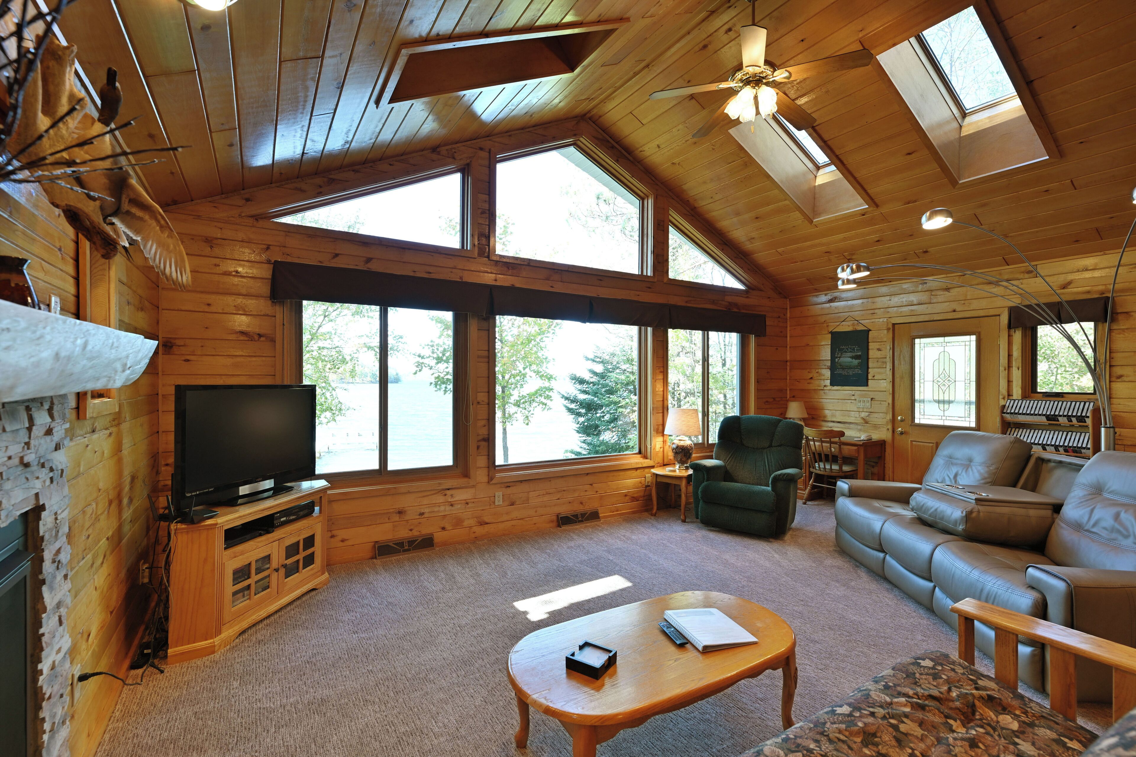 Room, Multiple Beds, Patio, Beach View | Living area | 32-inch TV with cable channels